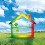 Illustration of a rainbow-colored home on top of an image of a grassy field on a sunny day.